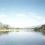 About a kilometer's walk down from the center of Vang Vien may be found this breathtakingly picturesque view of natural Laos - under threat?