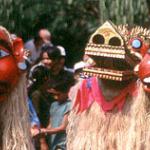 Pu No and Na No, the town's guardians, prepare for the parade. Luang Prabang, Laos.
