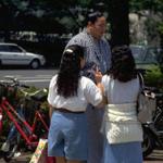 The Tokyo district of Rygoku is home of one of Japan's most famous Sumo wrestling facilities. Sumo wrestlers train very strenuously for their six annual basho tournaments, and must consume up to 10,000 calories a day to achieve and maintain their enormous stature. When they're not in training however, they can be seen strolling the city sidewalks wearing blue and white cotton robes called yukata.