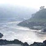 The early morning mist lifts off the Mekong River at Pakbeng.